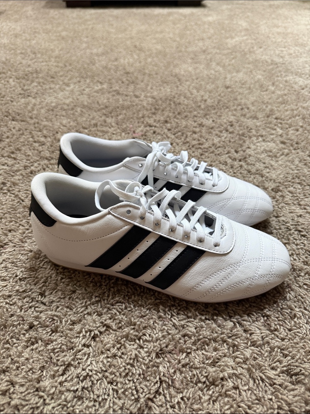 Adidas Womenโs tae kwon do White & Black Classic Three-Stripe Sneakers